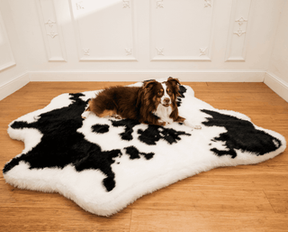 PupRug™ Animal Print Memory Foam Dog Bed - Black Faux Cowhide | Plushie Depot