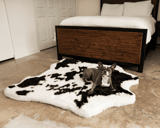 PupRug™ Animal Print Memory Foam Dog Bed - Black Faux Cowhide | Plushie Depot