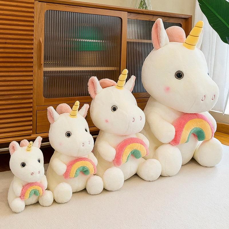 Adorable Unicorn Plushie Holding a Rainbow Stuffed Animals - Plushie Depot