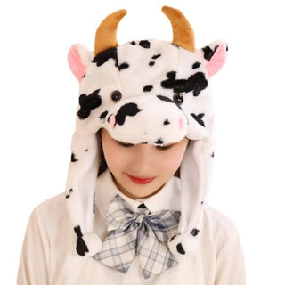Cute Cow Animal Plush Hat with Moving Ears Winter Fluffy Stuffed Earflap Cap A Plushie Depot